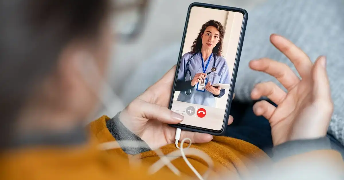 Patient attending telehealth consultation with qualified healthcare practitioner.